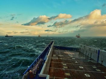 Scenic view of sea against cloudy sky