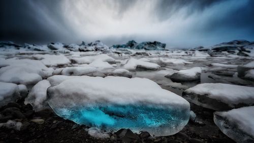 Scenic view of frozen sea against sky