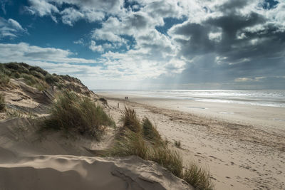 Scenic view of beach against sky