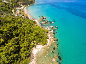 Aerial view of sea and landscape against sky