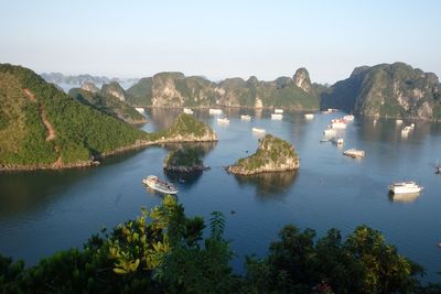 Scenic view of calm lake with mountains in background