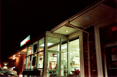 Low angle view of illuminated building at night