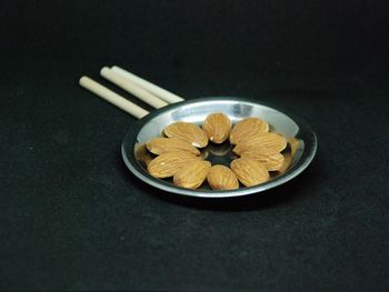 High angle view of fruits in plate on table