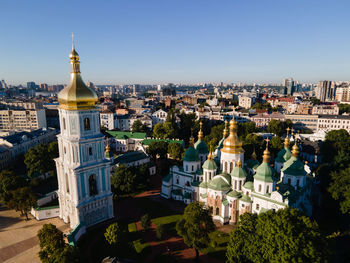 High angle view of buildings against clear sky
