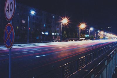 Traffic on city street at night