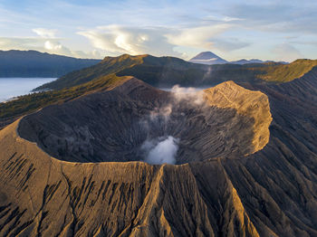 Smoke emitting from volcanic mountain at bromo tengger semeru national park, east java, indonesia
