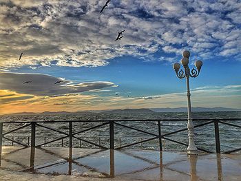 Scenic view of sea against cloudy sky