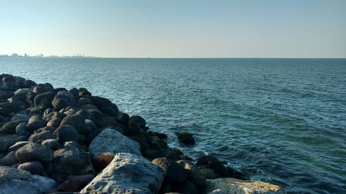 Scenic view of sea against clear sky