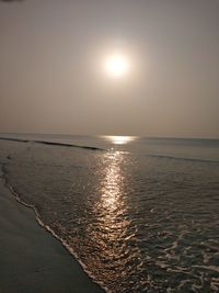 Scenic view of sea against sky at sunset