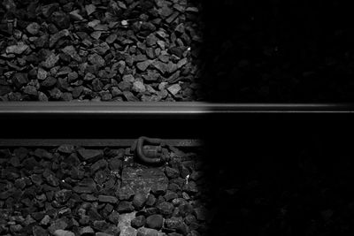 Close-up of stones on railroad track