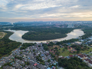 High angle view of buildings in city against sky