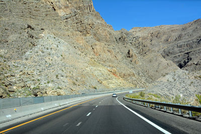 Close-up of road against clear sky