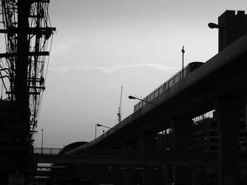 Low angle view of construction site against sky