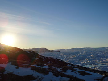 Scenic view of mountains against sky during winter