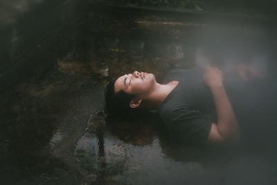 High angle portrait of woman relaxing in water