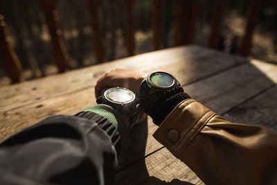 Cropped image of couple holding hands