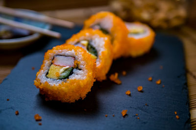 Close-up of sushi in plate on table