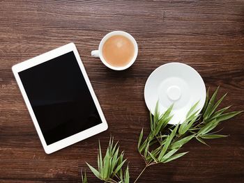 High angle view of coffee cup on table