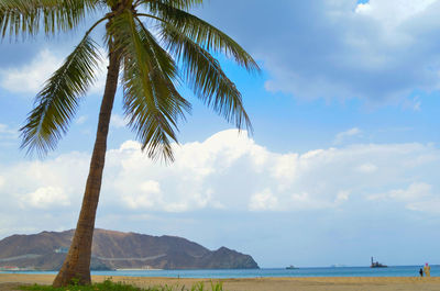 Scenic view of sea against cloudy sky