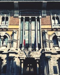 Low angle view of old building in city