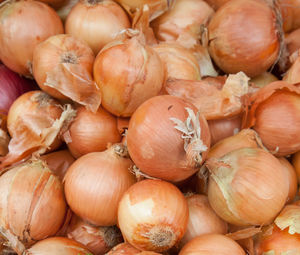 Full frame shot of onions at market