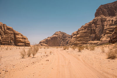 Rock formations in desert against sky