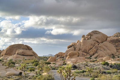 Rock formations in desert against sky