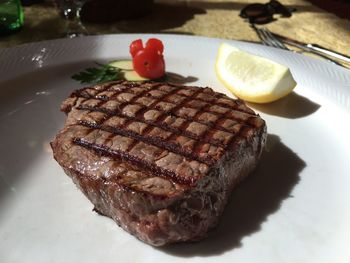 Close-up of meat on barbecue grill