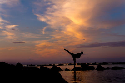 Scenic view of sea at sunset