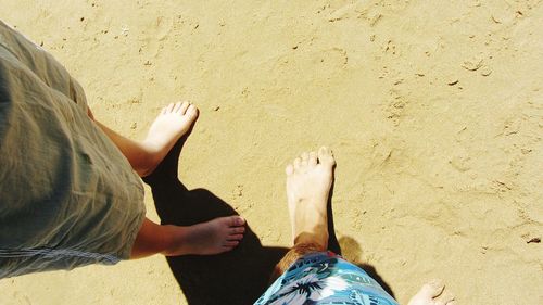 Low section of woman standing on ground