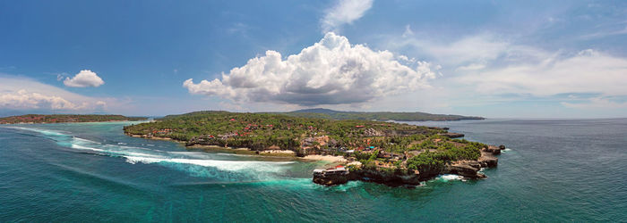 Panoramic view of sea against cloudy sky