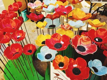 High angle view of multi colored umbrellas on table