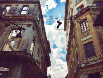 Low angle view of buildings in city against sky