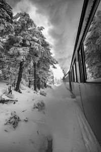 Scenic view of snow covered mountains against sky