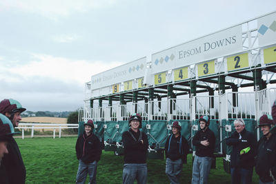 People standing in front of building