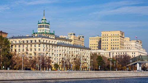 Buildings in city against sky