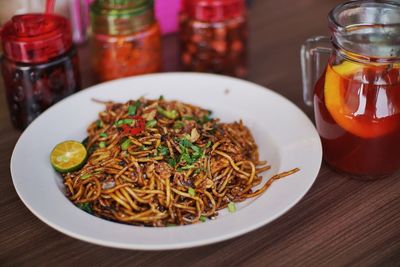 Close-up of noodles in bowl on table