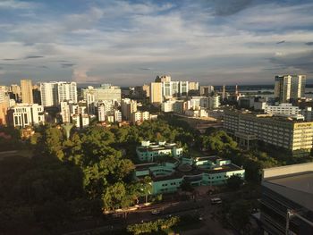 High angle view of buildings in city against sky