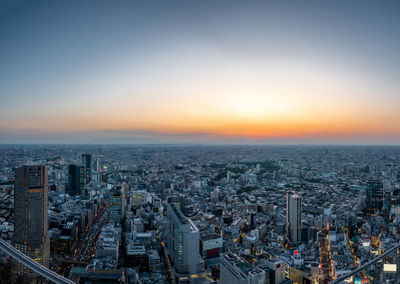 High angle view of cityscape against sky during sunset