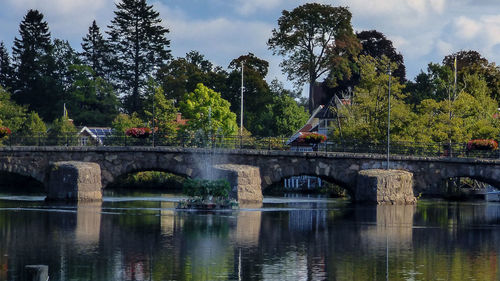 Bridge over river against sky