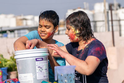 Kids preparing for holi festival