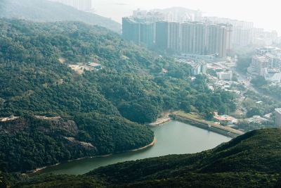 High angle view of river amidst buildings in city