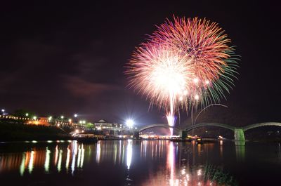 Firework display at night