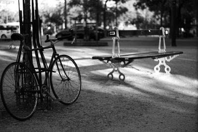 Bicycle parked on street in city