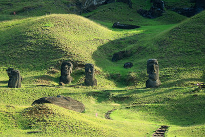 Hundreds of abandoned moai statue on rano raraku volcano, easter island