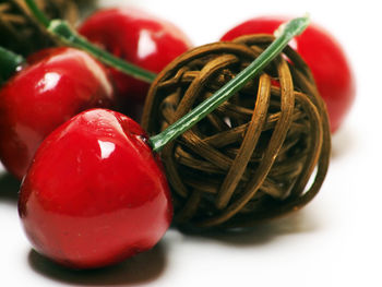 Close-up of strawberry over white background