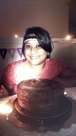 Portrait of smiling man standing at home