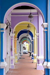 Multi colored arcade at building corridor