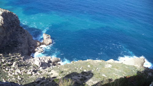 High angle view of rocks on beach
