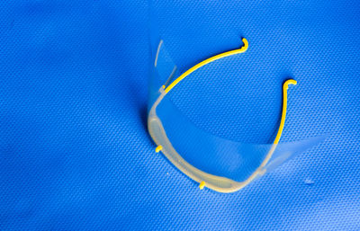 High angle view of bubble against blue background